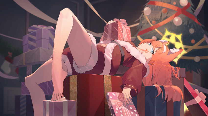 1girl absurdres animal_ear_fluff animal_ears bare_shoulders barefoot blue_archive blue_eyes cat_ears christmas christmas_stocking christmas_tree commentary_request feet gift hairband halo highres indoors long_hair long_sleeves lying mari_(blue_archive) off-shoulder_jacket off_shoulder on_back orange_hair riok_hh santa_costume shirt solo toes white_hairband yellow_halo