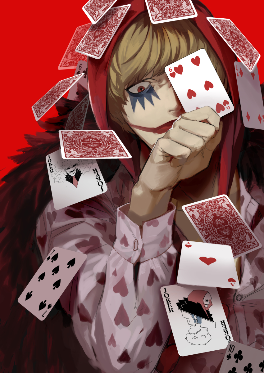 1boy absurdres ace_(playing_card) ace_of_hearts blonde_hair card coat donquixote_doflamingo donquixote_rocinante fur_coat hat heart heart_card highres joker_(playing_card) makeup male_focus one_eye_covered one_piece playing_card red_background santagawa short_hair solo