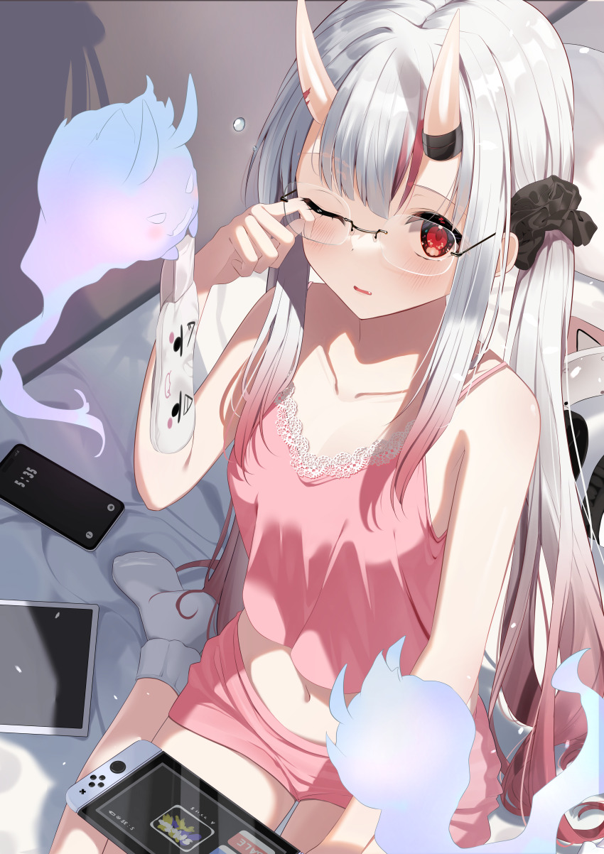 1girl absurdres alternate_costume bespectacled blush borumete camisole cellphone commentary_request ghost glasses gradient_hair grey_hair highres holding holding_mask hololive horns indoors karma_(nakiri_ayame) long_hair looking_at_viewer low_ponytail mask multicolored_hair nakiri_ayame navel nintendo_switch on_bed one_eye_closed parted_lips phone pink_camisole pink_shorts ponytail rectangular_eyewear red_eyes red_hair rimless_eyewear shiranui_(nakiri_ayame) short_shorts shorts sidelocks sitting skin-covered_horns sleep_mask smartphone solo streaked_hair tablet_pc very_long_hair virtual_youtuber wariza