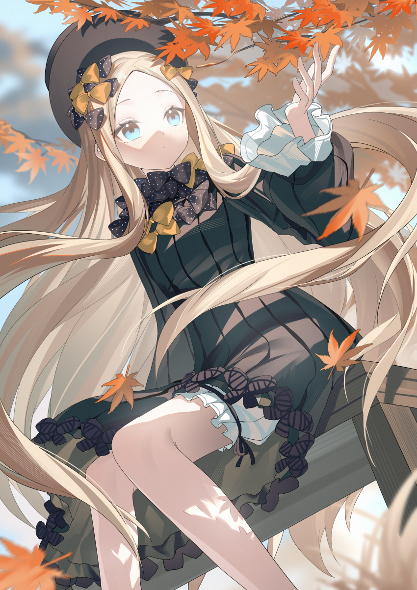1girl abigail_williams_(fate) absurdres autumn autumn_leaves black_dress blonde_hair bloomers blue_eyes dress expressionless fate/grand_order fate_(series) floating_hair hat highres leaf long_hair miyu10366 outdoors sitting solo underwear very_long_hair white_bloomers