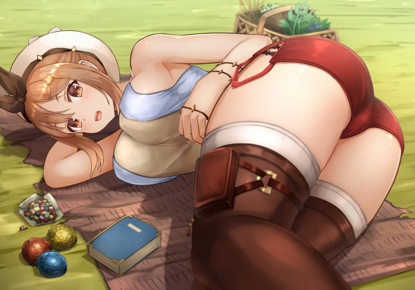1girl ass ass_focus atelier_(series) atelier_ryza basket blanket book breasts brown_eyes brown_hair hair_ornament hairclip large_breasts looking_at_viewer lying on_side open_mouth outdoors red_shorts reisalin_stout short_hair shorts skindentation solo thighhighs thighs tosaka_(tosaka0001) white_headwear