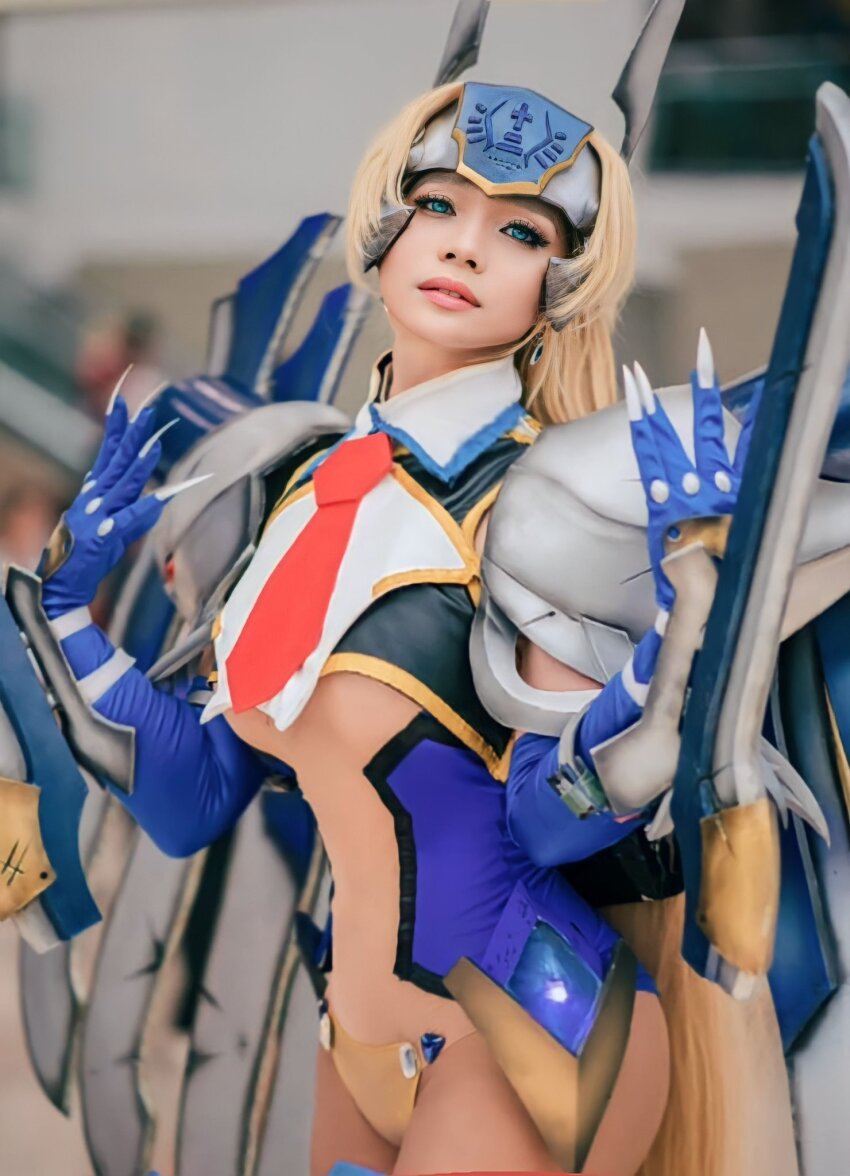 1girl arc_system_works armor asian bikini_armor blazblue blazblue:_continuum_shift blonde_hair blue_eyes breasts cosplay cosplay_photo cyborg fantastic_nami highres large_breasts long_hair looking_at_viewer mecha_musume medium_breasts mu-12 mu-12_(cosplay) noel_vermillion noel_vermillion_(cosplay) photo_(medium) real_life revealing_clothes sword sword_wings underboob weapon wings