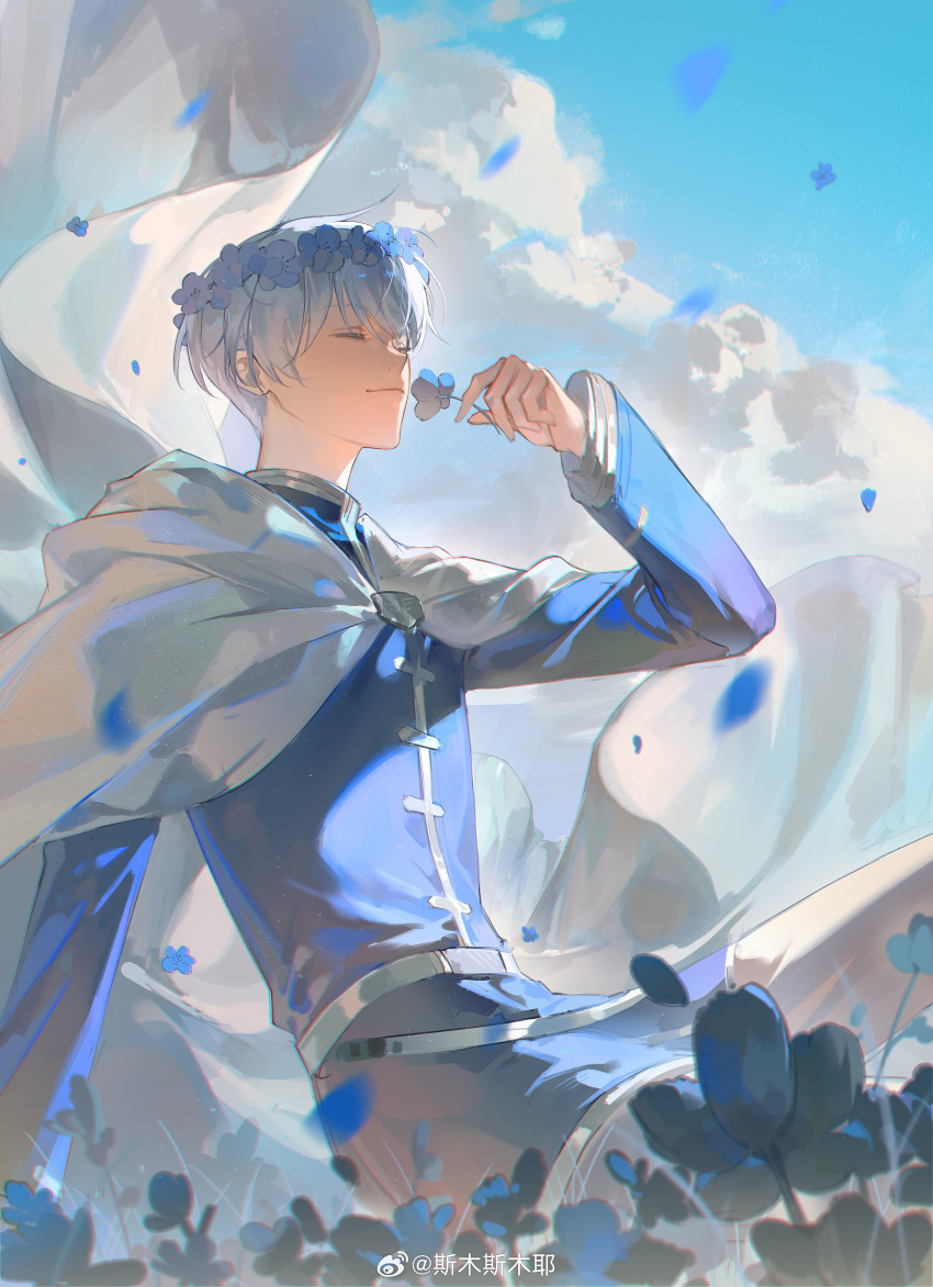 1boy absurdres artist_name belt blue_flower blue_hair blue_petals blue_shirt blue_sky blue_theme cape cloak closed_eyes closed_mouth cloud cloudy_sky day falling_petals field floating floating_cape flower flower_field flower_wreath grass head_wreath highres himmel_(sousou_no_frieren) holding holding_flower hood hooded_cloak light long_sleeves male_focus nemophila_(flower) on_flower outdoors pants parted_bangs petals shirt short_hair sitting sky smelling smusmuye solo solo_focus sousou_no_frieren watermark weibo_watermark white_cape white_pants wind