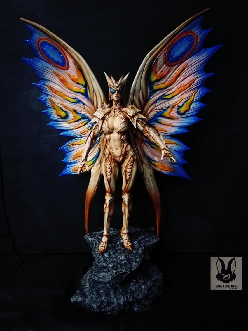 1girl adapted_costume armor armor_mothra batzemo bikini_armor blue_eyes breasts cleavage cleavage_cutout clothing_cutout figure geng_gi godzilla:_king_of_the_monsters godzilla_(series) helmet highres kaiju legendary_pictures medium_breasts monsterverse mothra mothra_(series) mothra_leo personification rainbow_mothra real_life rebirth_of_mothra_iii revealing_clothes toho toned toned_female toned_stomach wings