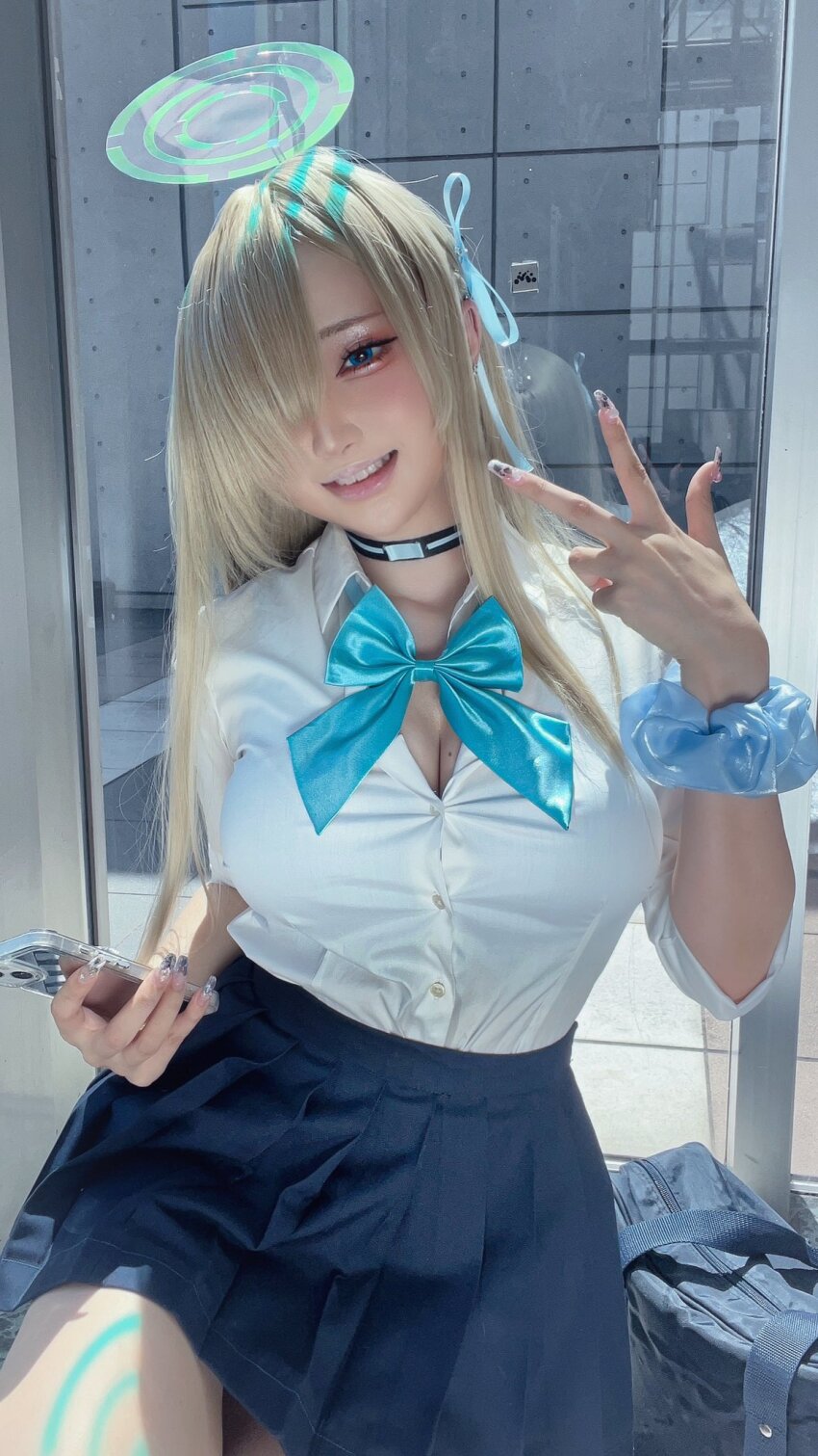 asuna_(blue_archive) blonde_hair blue_archive blue_eyes breasts chamomile_(cosplayer) cleavage cosplay cosplay_photo fingernails halo halo_behind_head highres peace photo_(medium) school_uniform smiley_face v