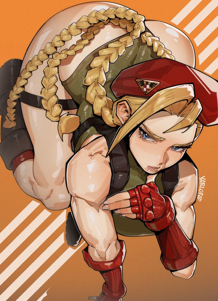 1girl absurdres alohapz ass bare_shoulders black_boots blonde_hair blue_eyes boots braid breasts cammy_white fingerless_gloves gauntlets gloves green_leotard hat highres large_breasts leotard orange_background red_gloves red_hat simple_background solo street_fighter twin_braids