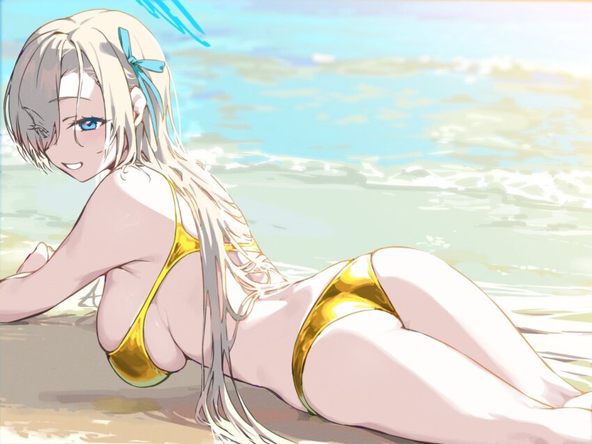 1girl ass asuna_(blue_archive) beach bikini blonde_hair blue_archive blue_eyes blue_halo blue_ribbon breasts commentary gold_bikini haimura_kiyotaka hair_over_one_eye hair_ribbon halo large_breasts long_hair lying ocean on_stomach outdoors parted_lips ribbon sideboob smile solo swimsuit very_long_hair