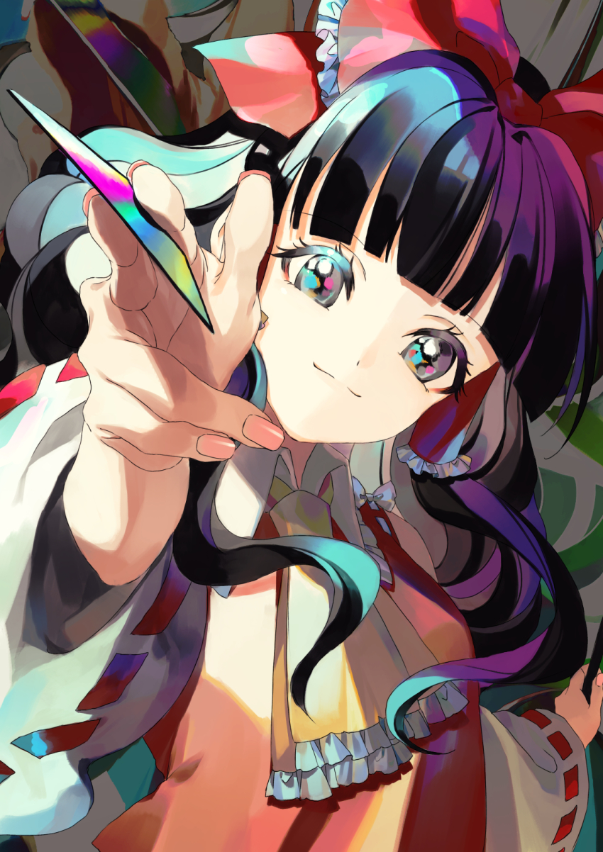1girl ama_asagi ascot between_fingers black_eyes black_hair blunt_bangs card close-up closed_mouth colored_eyelashes fingernails foreshortening frills hair_tubes hakurei_reimu highres holding long_hair looking_at_viewer multicolored_eyes multicolored_hair smile solo touhou yellow_ascot