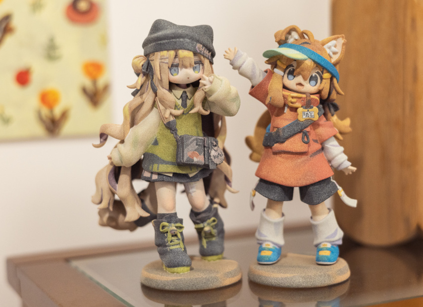 2girls :3 ahoge animal_ear_fluff animal_ear_headwear animal_ears arm_up bag bandaid bandaid_on_knee bandaid_on_leg beanie black_ribbon black_shoes black_shorts black_skirt black_socks blonde_hair blue_eyes blue_shoes blurry blurry_background boots brown_hair cat_ears cat_girl collared_shirt depth_of_field dog_ears dog_girl dog_tail ears_through_headwear fake_animal_ears fang fanny_pack figure figure_(medium) film_grain fish_hair_ornament full_body green_shirt green_sweater green_vest hair_between_eyes hair_bun hair_ornament hair_ribbon hairclip hand_up hat highres indoors kipfel_(vrchat) layered_sleeves leg_warmers long_hair long_sleeves looking_at_viewer loose_socks mamehinata miniskirt mukumi multiple_girls neck_ribbon open_mouth orange_shirt photo_(medium) photo_background pleated_skirt red_shirt ribbon shirt shoes short_over_long_sleeves short_sleeves shorts shoulder_bag sidelocks skirt sleeves_past_wrists smile socks standing standing_on_one_leg stool sweater sweater_vest tail very_long_hair vest visor_cap vrchat waving wavy_hair white_bag white_shirt white_socks