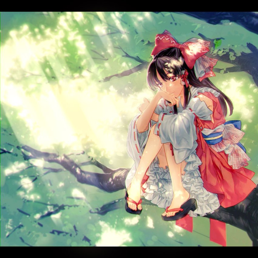 1girl arms_on_knees bare_legs black_hair black_sandals blurry blurry_background bow branch detached_sleeves female_focus frilled_skirt frills hair_bow hakurei_reimu highres in_tree kayako_(tdxxxk) knees_together_feet_apart layered_skirt letterboxed light_rays long_hair looking_at_viewer red_bow red_eyes red_skirt ribbon-trimmed_sleeves ribbon_trim sandals sitting sitting_in_tree skirt smile solo sun_light sunbeam sunlight toes touhou tree tree_shade wide_sleeves