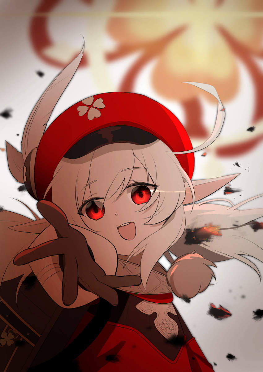 1girl :d absurdres ahoge backpack bag blurry brown_gloves brown_scarf burn cabbie_hat clover_print coat commentary_request depth_of_field eyes_visible_through_hair fingertip_gentleman from_side genshin_impact gloves glowing glowing_eyes hair_between_eyes hat hat_feather hat_ornament head_tilt highres klee_(genshin_impact) light_brown_hair long_hair long_sleeves looking_at_viewer looking_to_the_side low_twintails open_mouth pointy_ears randoseru reaching reaching_towards_viewer red_coat red_eyes red_hat scarf sidelocks simple_background smile solo twintails wind