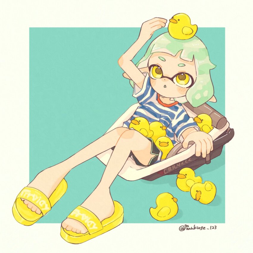 1girl artist_name black_shorts bloblobber_(splatoon) border commentary dolphin_shorts dot_nose green_background green_hair green_trim highres inkling inkling_girl inkling_player_character medium_hair mukuge_123 nintendo open_mouth outside_border pointy_ears rubber_duck sandals shirt short_eyebrows shorts simple_background sitting solo splatoon_(series) splatoon_3 striped_clothes striped_shirt symbol-only_commentary t-shirt tentacle_hair toes twitter_username white_border yellow_eyes yellow_sandals