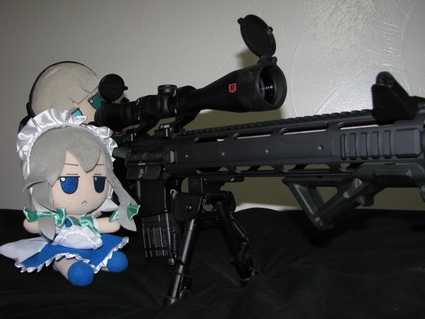 2girls aiming bipod blue_eyes bob_cut bow closed_mouth frilled_sleeves frills fumo_(doll) green_bow green_eyes grey_hair gun hair_bow izayoi_sakuya jitome konpaku_youmu maid maid_headdress maid_unfiorm multiple_girls photo_(medium) rifle scope short_hair sidelocks sitting sniper_rifle source_request teamwork touhou weapon