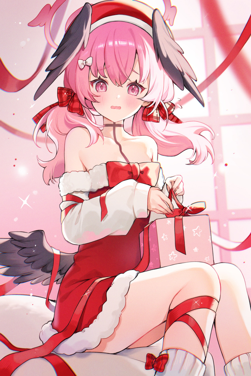 1girl blue_archive blush box dress fur-trimmed_dress fur_trim gift gift_box hair_ribbon halo hat head_wings highres indoors koharu_(blue_archive) long_hair low_wings open_mouth pink_eyes pink_hair red_dress red_hat red_ribbon ribbon santa_costume sitting solo twintails wings yenkoes