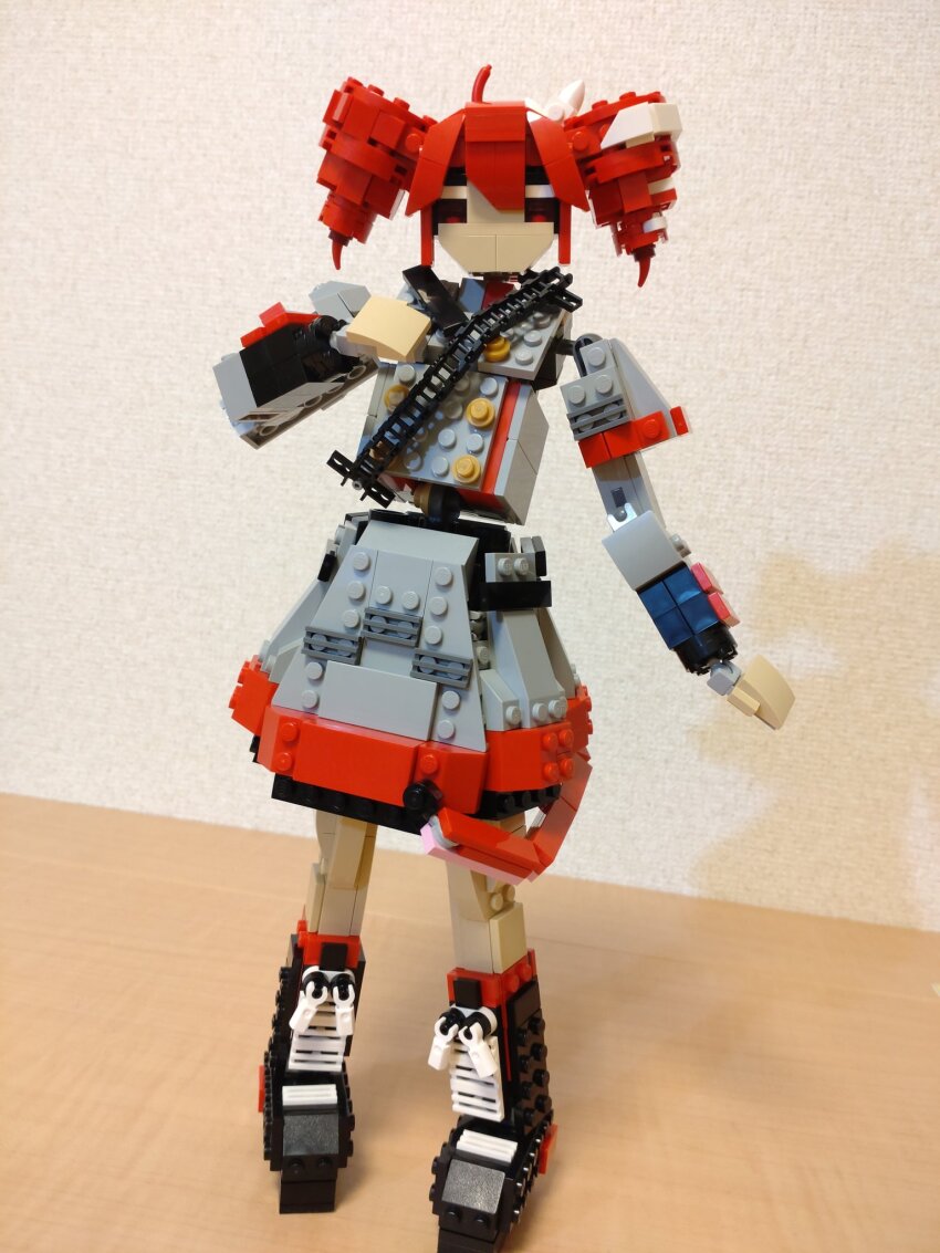 1girl ahoge black_boots boots buttons choroli_(chorolin) double-breasted drill_hair full_body grey_jacket grey_skirt hair_between_eyes hair_ribbon hand_up highres jacket kasane_teto kasane_teto_(sv) lego_(medium) long_sleeves looking_at_viewer red_eyes red_hair ribbon shoulder_belt skirt solo standing synthesizer_v twin_drills unconventional_media utau white_ribbon