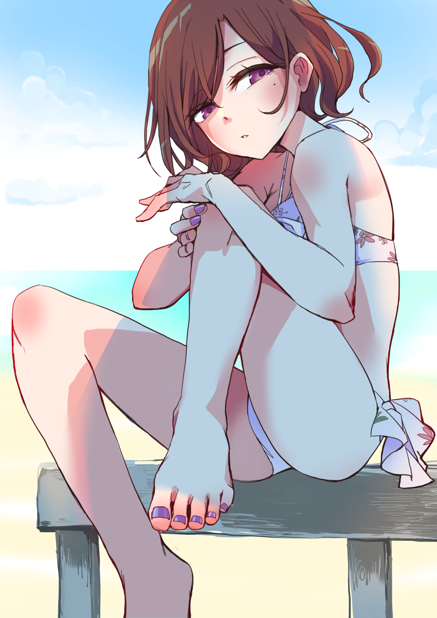 1girl absurdres ass barefoot bench bikini brown_hair floral_print galahad_01 highres higuchi_madoka idolmaster idolmaster_shiny_colors looking_at_viewer mole mole_under_eye nail_polish parted_lips purple_eyes purple_nails short_hair sitting solo swimsuit toenail_polish toenails