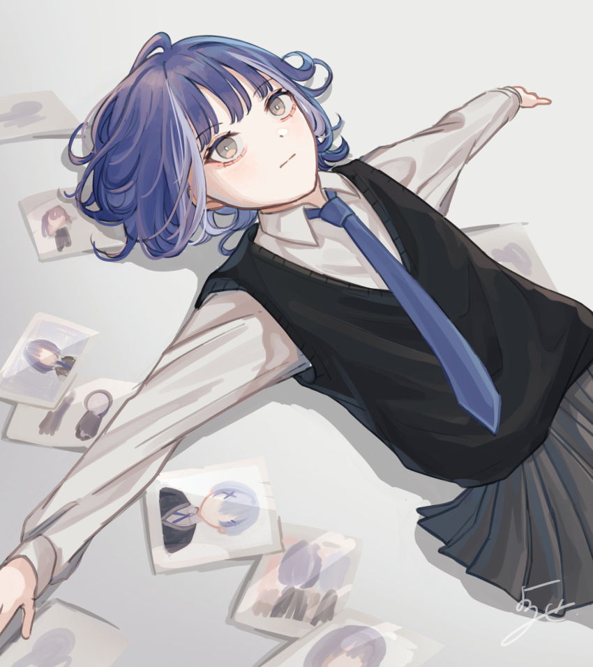 1girl black_sweater_vest blue_hair blue_necktie bright_pupils collared_shirt commentary_request grey_eyes grey_skirt highres lying medium_hair multicolored_hair necktie original photo_(object) pleated_skirt shirt signature skirt solo streaked_hair sweater_vest two-tone_hair white_hair white_pupils white_shirt yoruse