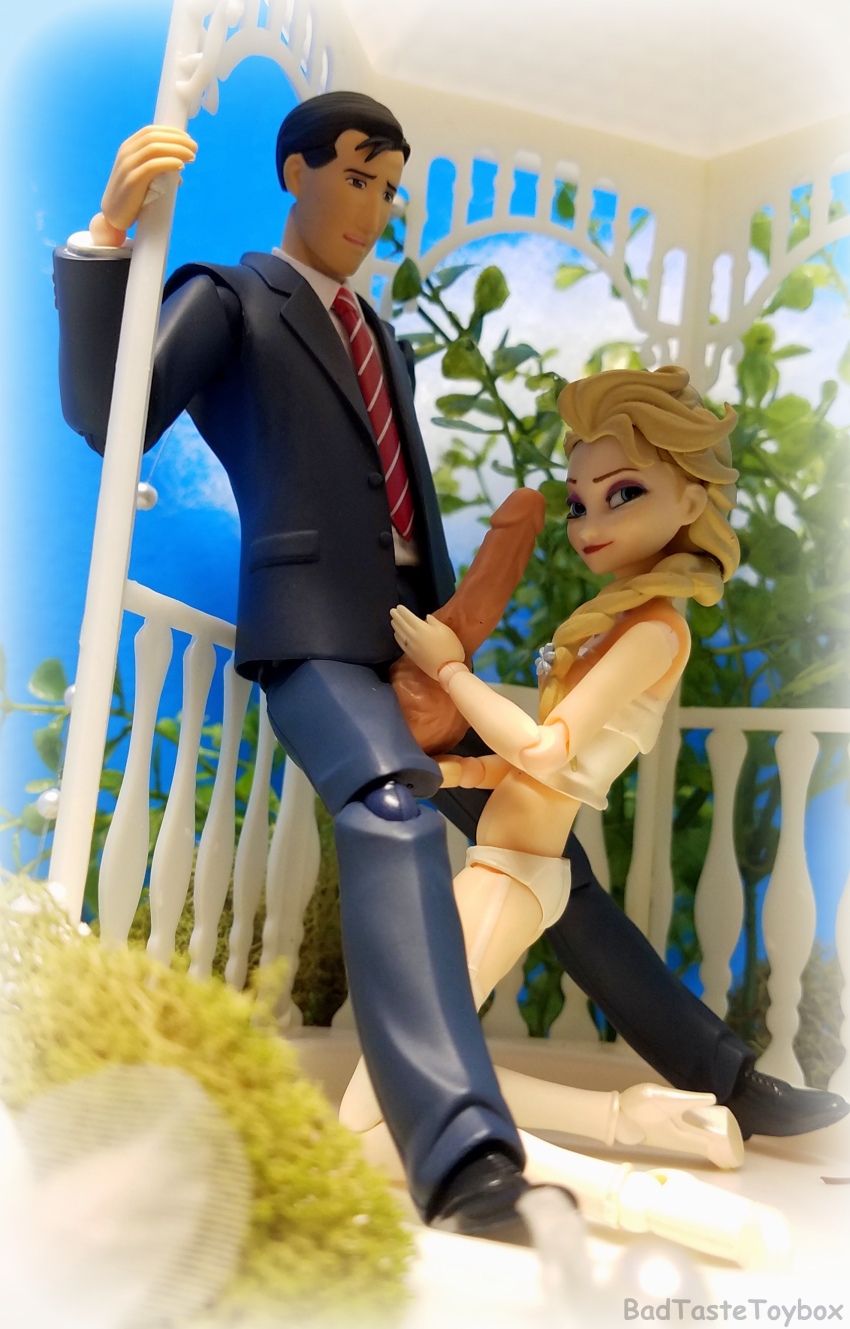 1boy 1girl absurdres action_figure blonde_hair blue_background braid bride couple crossover disney elsa_(frozen) eyeshadow figma formal_clothes frozen_(disney) gazebo goro_inogashira groom highres huge_penis imminent_fellatio kneeling lingerie looking_at_viewer makeup naughty_face penis penis_grab photo_(medium) pink_eyeshadow purple_eyes railing revoltech suit testicle_grab toy uncensored underwear worried