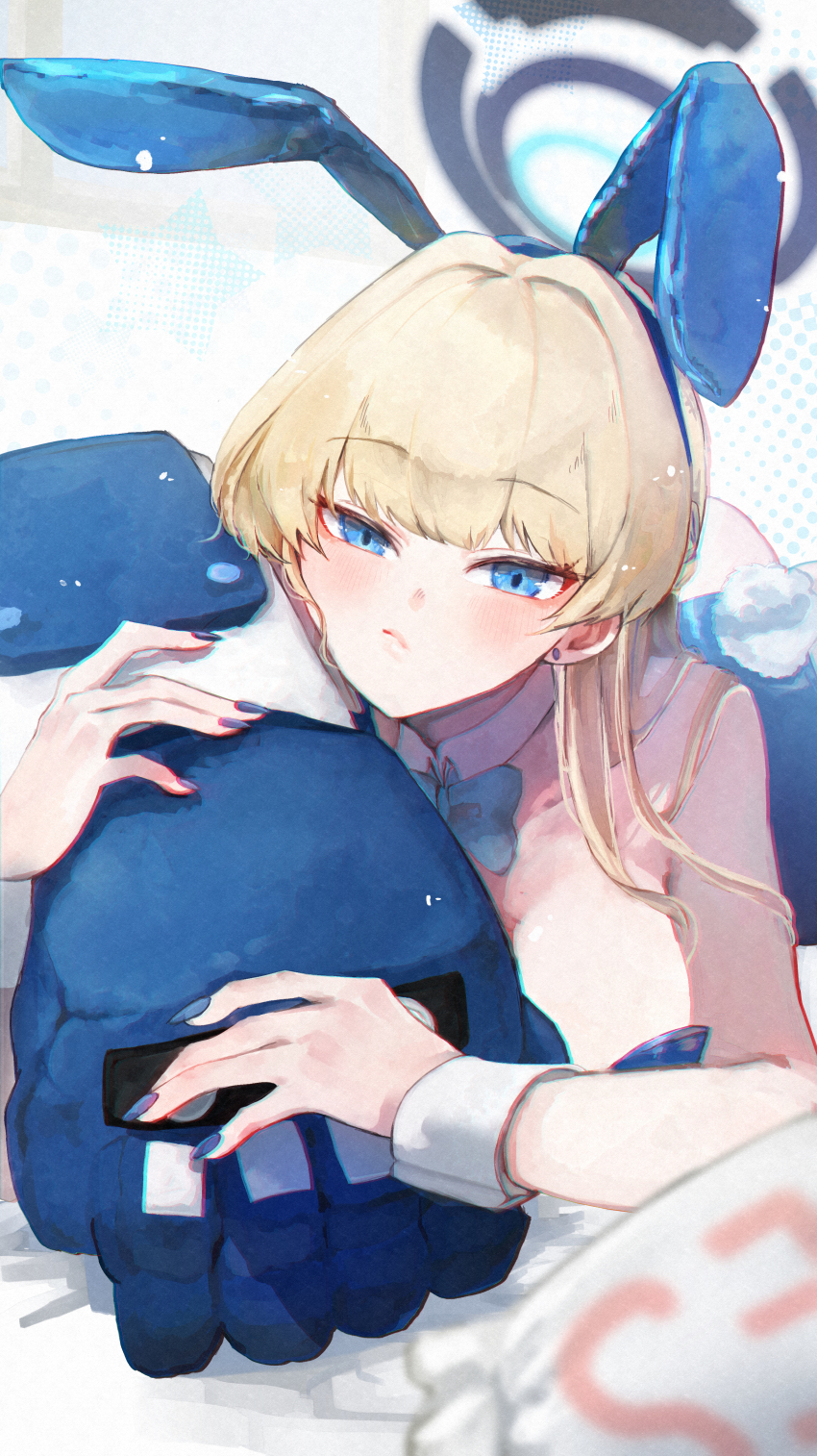 1girl absurdres animal_ear_hairband animal_ears blonde_hair blue_archive blue_bow blue_bowtie blue_eyes blue_hairband blue_leotard blue_nails blush bow bowtie breasts closed_mouth detached_collar fake_animal_ears fake_tail gloves hair_between_eyes hairband highres holding holding_gloves holding_unworn_clothes koyuuuuuuuuuuu large_breasts leotard looking_at_viewer lying on_stomach pout rabbit_ear_hairband rabbit_ears rabbit_tail sidelocks tail toki_(blue_archive) toki_(bunny)_(blue_archive) unworn_gloves