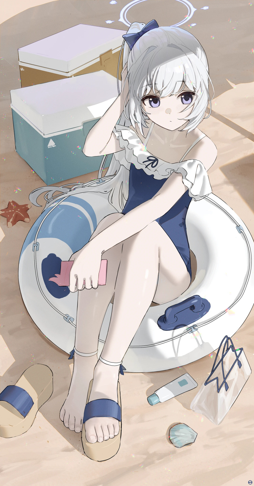 1girl absurdres bare_shoulders blue_archive blue_halo blue_one-piece_swimsuit casual_one-piece_swimsuit closed_mouth collarbone frilled_one-piece_swimsuit frills full_body halo highres holding holding_phone knees_up long_hair looking_at_viewer miyako_(blue_archive) miyako_(swimsuit)_(blue_archive) off-shoulder_one-piece_swimsuit off_shoulder official_alternate_costume on_innertube one-piece_swimsuit phone ponytail purple_eyes sand seashell shell shoes single_bare_foot sitting solo songchuan_li swimsuit toes transparent_bag white_hair white_innertube