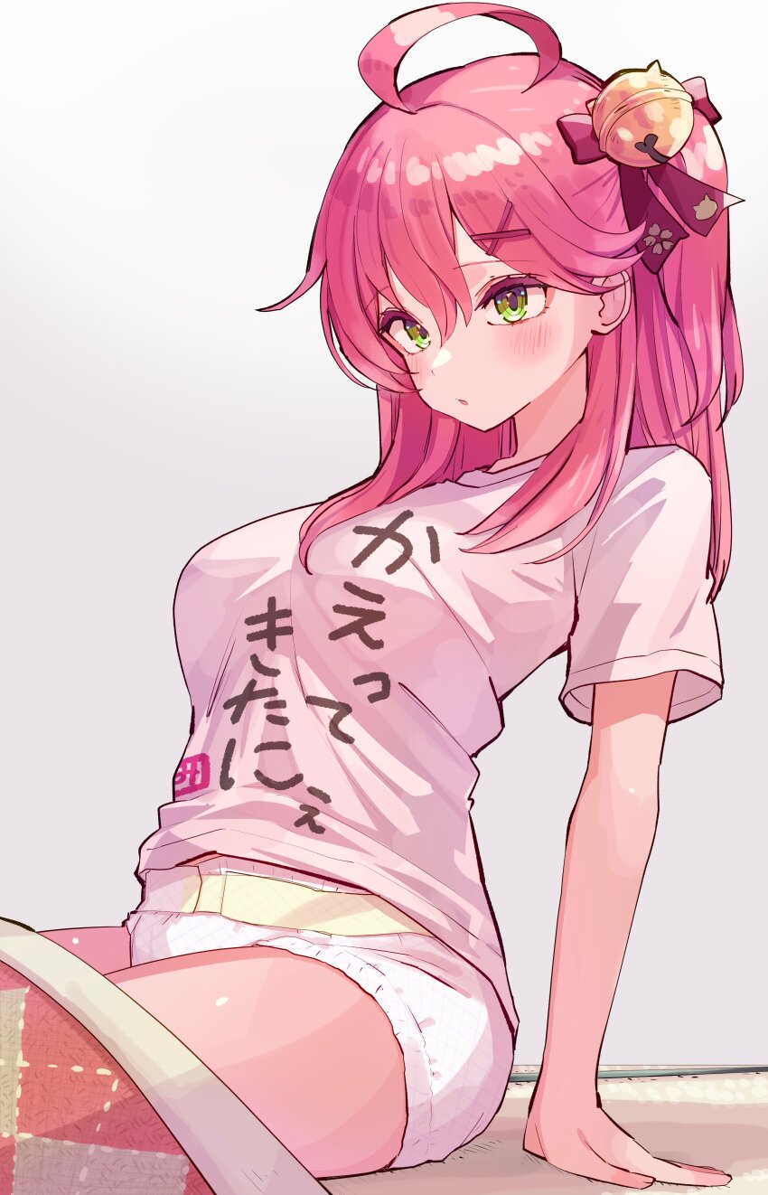 1girl absurdres ahoge alternate_costume bell blush bow breasts clothes_writing commentary_request diaper futon green_eyes hair_bell hair_between_eyes hair_bow hair_ornament hairclip highres hololive jingle_bell large_breasts long_hair nanado_shion pink_bow pink_hair pink_shirt sakura_miko shirt short_sleeves sitting solo t-shirt thighs virtual_youtuber white_background