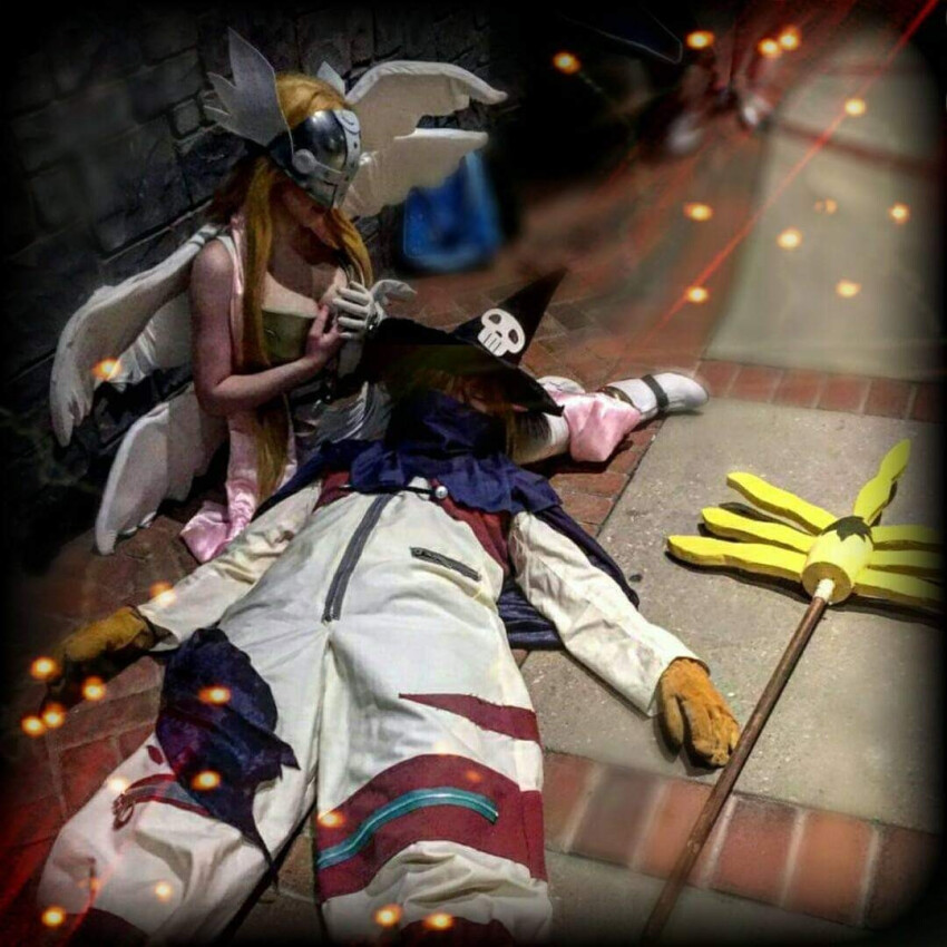 angewomon angewomon_(cosplay) blonde_hair cosplay digimon long_hair mask photo_(medium) real_life wings wizarmon wizarmon_(cosplay)