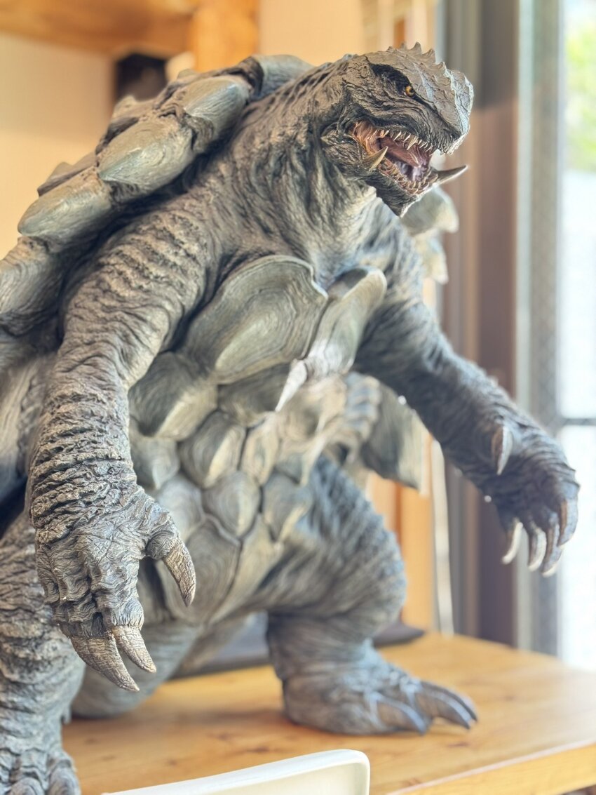 desk fangs full_body gamera gamera_(2015_short) gamera_(series) giant giant_monster highres kadokawa kaiju marza_animation_planet model_kit monster no_humans official_art omnibus_japan open_mouth sculpture sea_monster sharp_teeth takahama_kan teeth tongue turtle tusks yellow_eyes