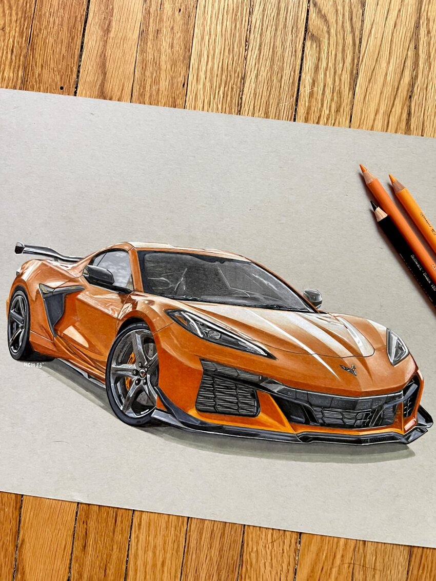 art_tools_in_frame car chevrolet chevrolet_corvette chevrolet_corvette_c8 colored_pencil colored_pencil_(medium) commentary english_commentary grey_background hannah_(handrawnby) highres motor_vehicle no_humans orange_car original pencil photo_(medium) shadow spoiler_(automobile) sports_car traditional_media vehicle_focus