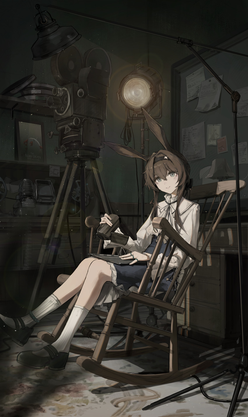 1girl absurdres amiya_(arknights) animal_ears anklet arknights billboard black_hairband black_ribbon black_shoes black_skirt brown_hair camera chair character_name chest_of_drawers clapperboard closed_mouth commentary dragon_bubble_(arknights) film_strip fingernails full_body green_eyes hair_between_eyes hair_intakes hairband highres holding holding_camera indoors jewelry kneehighs lamp lens_flare light_particles long_hair long_sleeves looking_at_viewer movie_projector multiple_rings neck_ribbon nueegochi on_chair paper picture_frame projector recording_studio ribbon ring shelf shirt shoes sitting skirt smile socks solo stage_lights studio video_camera white_shirt white_socks