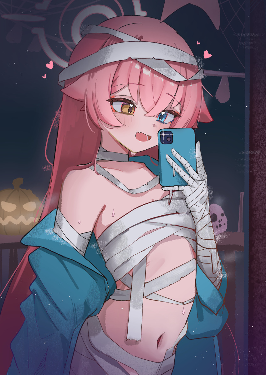 1girl absurdres ahoge bandaged_arm bandaged_chest bandaged_hand bandaged_head bandages blue_archive blue_eyes blue_jacket blush cellphone chest_sarashi cosplay crossed_bangs fang hair_between_eyes halloween halo heart heart_in_eye heterochromia high_(hgih) highres holding holding_cellphone holding_phone hoshino_(blue_archive) huge_ahoge jack-o&#039;-lantern jacket light_blush loli long_hair looking_at_phone mummy_costume naked_bandage navel off_shoulder open_clothes open_jacket open_mouth phone pink_hair pink_halo sarashi selfie skin_fang smartphone smile solo standing sweat symbol_in_eye very_long_hair yellow_eyes