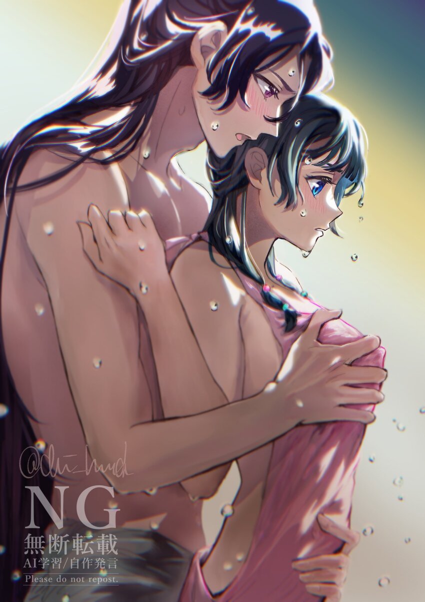 Two bodies embrace in a passionate hug