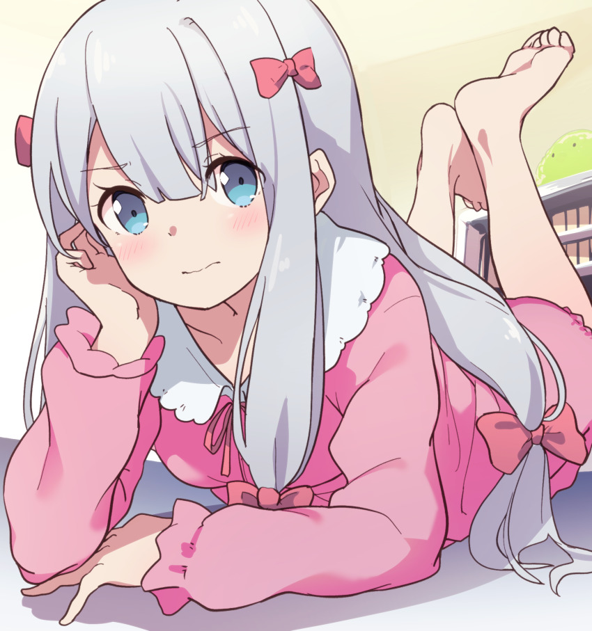 arm_support barefoot blue_eyes blush closed_mouth eromanga_sensei feet hair_ribbon hand_on_own_cheek hand_on_own_face highres izumi_sagiri light_frown long_hair looking_at_viewer low-tied_long_hair lying on_stomach pajamas pink_pajamas pink_ribbon ribbon sidelocks silver_hair solo suwakana the_pose wavy_mouth