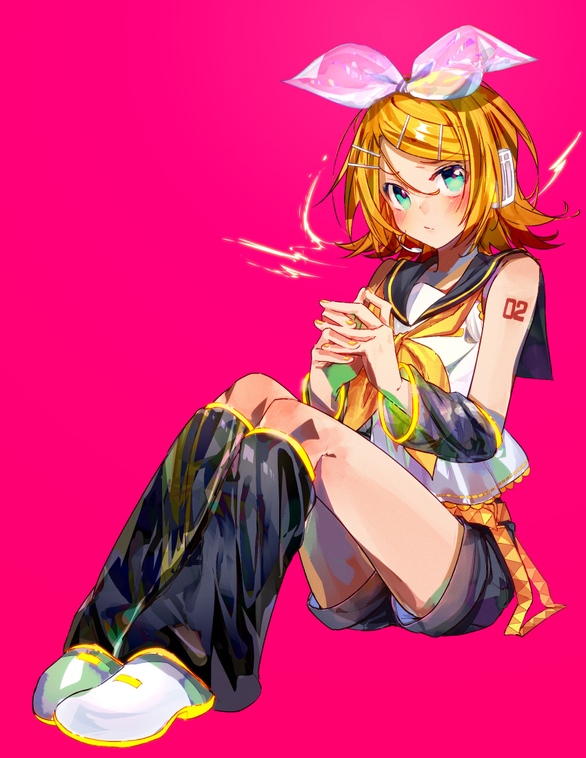 1girl belt blonde_hair blue_eyes bow commentary_request detached_sleeves flipped_hair full_body hair_bow hair_ornament hairclip headphones headset highres kagamine_rin leg_warmers long_sleeves looking_at_viewer nail_polish neckerchief nyaumineko own_hands_together parallel_hairclips pink_background sailor_collar see-through_bow shirt short_hair shorts sitting sleeveless sleeveless_shirt solo vocaloid
