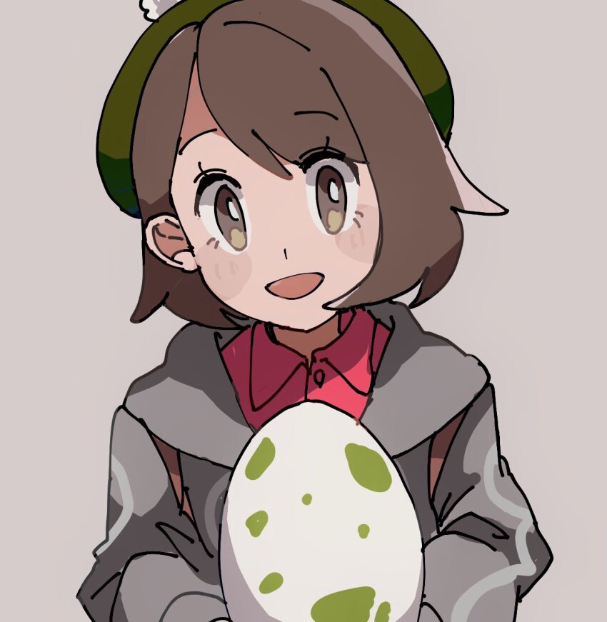 1girl :d bright_pupils brown_eyes brown_hair cardigan egg gloria_(pokemon) green_hat grey_background grey_cardigan hat highres nintendo open_mouth pokemon pokemon_egg pokemon_swsh shichibee_(stm_mimi) short_hair simple_background smile solo tam_o&#039;_shanter white_pupils