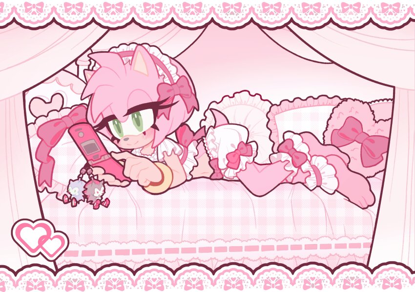 1girl absurdres alternate_costume amy_rose animal_nose barefoot blush border bow bracelet cellphone cellphone_charm character_charm charm_(object) commentary english_commentary eyelashes flip_phone flora_(florathemoth) furry furry_female gold_bracelet green_eyes hairband hedgehog_girl highres jewelry lace lace_border lolita_fashion midriff ornate_border phone pillow pink_fur pink_theme red_hairband shadow_the_hedgehog shirt short_tail shorts solo sonic_(series) sonic_the_hedgehog tail white_shirt white_shorts