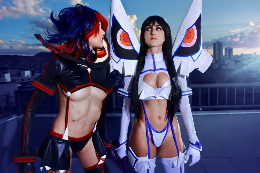 2girls absurdres black_hair black_panties brazilian_(nationality) breasts building cleavage cosplay gloves highres holding holding_sword holding_weapon hole kill_la_kill kiryuuin_satsuki long_hair looking_at_another matoi_ryuuko multicolored_hair multiple_girls navel outdoors panties photo_(medium) railing real_life revealing_clothes skirt sky space_lesbians sword thong underboob underwear weapon white_panties