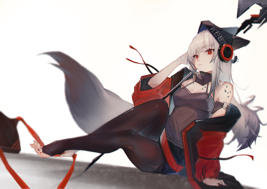 1girl absurdres animal_ears arknights beanie black_hat black_pantyhose black_shorts breasts closed_mouth ears_through_headwear fox_ears fox_girl fox_tail frostleaf_(arknights) full_body fuyoo grey_hair grey_shirt hand_in_own_hair hat headphones headphones_over_headwear highres implied_extra_ears jacket long_hair material_growth off_shoulder open_clothes open_jacket oripathy_lesion_(arknights) pantyhose red_eyes red_jacket shirt shorts solo stirrup_legwear tail toeless_legwear weapon