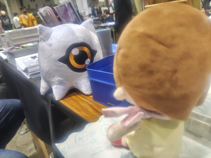 brown_hair digimon kuramon looking_at_another photo_(medium) real_life scarf stuffed_toy yagami_hikari