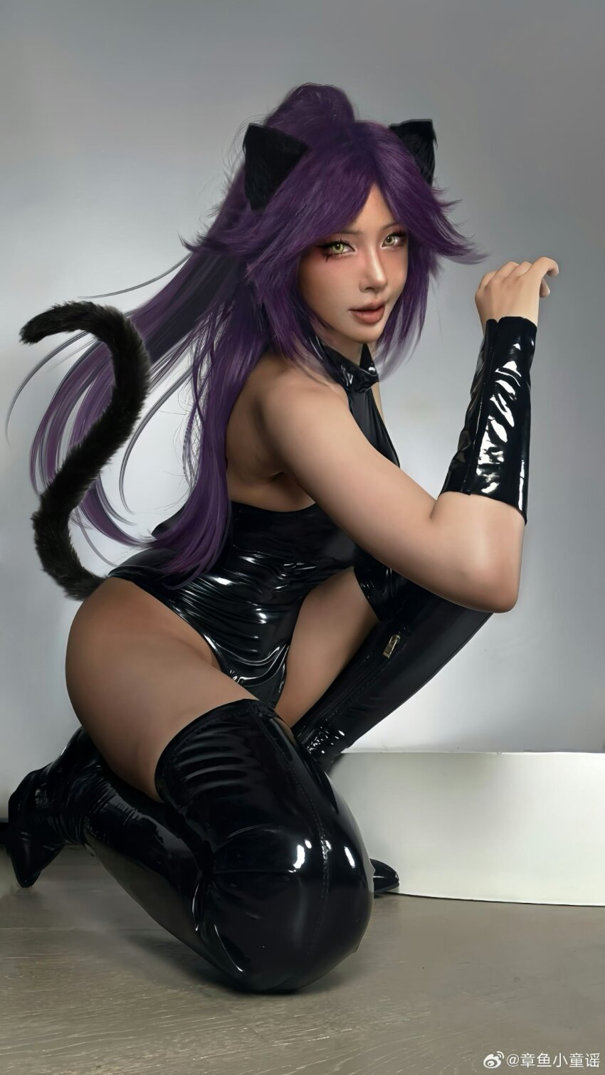 1girl animal_ears asian bare_shoulders black_leotard bleach bleach:_sennen_kessen-hen boots breasts cat_ears collarbone cosplay dark-skinned_female dark_skin female_focus hair_ornament highres large_breasts leotard lips long_hair looking_at_viewer parted_lips photo_(medium) ponytail purple_hair real_life shihouin_yoruichi shihouin_yoruichi_(cosplay) swuchunyi tail tan thigh_boots yellow_eyes