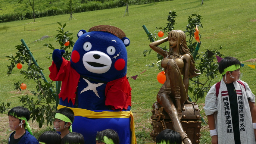 1girl 2021 absurdres arms_up bear bikini bikini_top_only border bracelet breasts cosplay cowboy_shot curvy dated full_body hand_in_own_hair highres jewelry kumamon large_breasts long_hair long_legs looking_away monkey_d._luffy_(cosplay) multiple_others nami_(one_piece) navel official_art one_piece open_mouth orange_hair pants photo_(medium) real_life sculpture shiny_skin sitting sky smile solo swimsuit treasure_chest upper_body