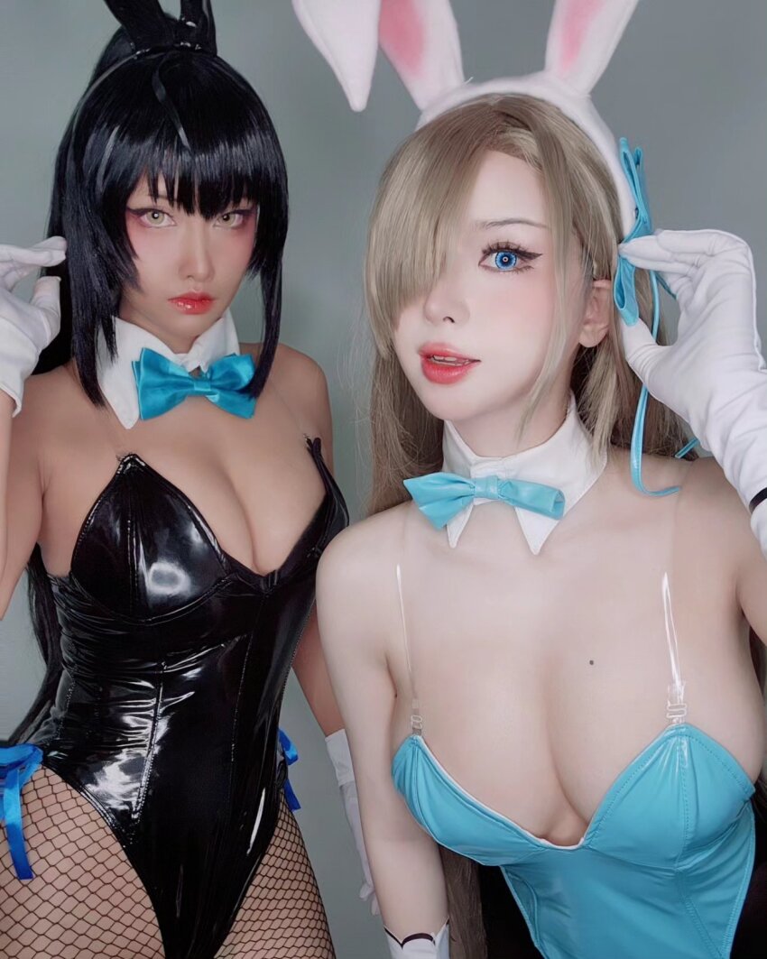 2girls aqua_eyes asian asuna_(blue_archive) black_hair blonde_hair blue_archive blue_eyes breasts bunny_girl cleavage cosaim cosplay fishnets gloves hair_over_one_eye highres karin_(blue_archive) large_breasts leotard looking_at_viewer misakicos multiple_girls pale_skin playboy_bunny rabbit_ears thai twitter yellow_eyes