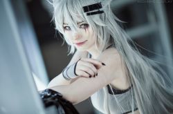  1girl arknights bare_shoulders cosplay cosplay_photo female_focus grey_eyes grey_hair hair_ornament hairclip highres keekihime lappland_(arknights) lappland_(arknights)_(cosplay) looking_at_viewer nail_polish photo_(medium) scar smile solo tank_top 