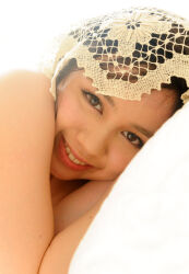1girl bed brown_eyes brown_hair day female_focus highres indoors japanese_(nationality) looking_at_viewer medium_hair mole photo_(medium) pillow smile solo tagme teeth upper_body yoshikawa_aimi rating:General score:7 user:Alkin