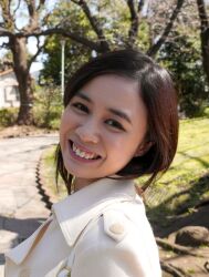 1girl blurry blurry_background brown_eyes brown_hair day female_focus japanese_(nationality) looking_at_viewer medium_hair mole outdoors photo_(medium) smile solo teeth upper_body yoshikawa_aimi rating:General score:3 user:Alkin