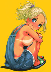  1girl bikini_tan black_sandals blonde_hair blue_eyes blue_nails blue_overalls blush breasts crossed_arms denim denim_overalls from_behind hair_ribbon highres large_breasts long_hair looking_at_viewer looking_back muramasa_mikado naked_overalls original overalls ponytail purple_ribbon ribbon sandals sitting smile tan tanline yellow_background 