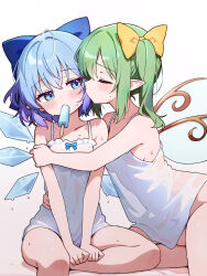  2girls blue_bow blue_eyes blush bow bow_camisole camisole chikuzen1996 cirno closed_eyes collarbone commentary_request covered_navel daiyousei fairy_wings food food_in_mouth green_hair hair_bow highres hug ice ice_wings multiple_girls no_pants one_side_up pointy_ears popsicle popsicle_in_mouth see-through_silhouette simple_background sitting sweat sweaty_clothes touhou white_background white_camisole wings yellow_bow yuri 