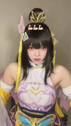  1girl animated black_eyes black_hair cosplay dress highres kagura_(mobile_legends) long_hair looking_at_viewer mobile_legends:_bang_bang monchy_moon photo_(medium) real_life solo sound tagme video white_dress  rating:General score:10 user:cci