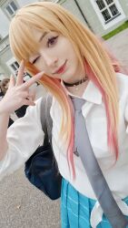  1girl blonde_hair cosplay cosplay_photo gyaru highres keekihime kitagawa_marin kitagawa_marin_(cosplay) photo_(medium) red_eyes school_uniform sono_bisque_doll_wa_koi_wo_suru 