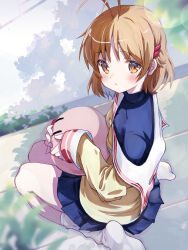  1girl =_hair_ornament akayama_yukihe antenna_hair blazer blue_skirt blurry blush brown_eyes brown_hair clannad closed_mouth commentary_request dango_daikazoku day depth_of_field dutch_angle from_above from_side frown full_body furukawa_nagisa hair_between_eyes hair_ornament hairclip highres hikarizaka_private_high_school_uniform holding holding_stuffed_toy jacket looking_at_viewer medium_hair miniskirt no_shoes outdoors pleated_skirt sailor_collar school_uniform serafuku sitting skirt sleeves_past_wrists socks solo stuffed_toy wariza white_sailor_collar white_socks |_| 