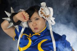  1girl asian black_hair capcom chun-li fat fat_woman female_focus photo_(medium) sakuran_watanabe solo street_fighter  rating:Questionable score:2 user:leejunne